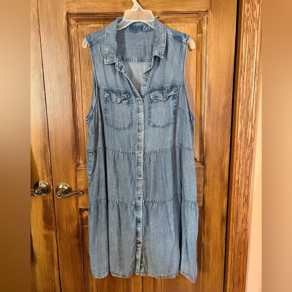 Sleeveless Blue Jean Dress with Tiered  button front and Chest pockets.